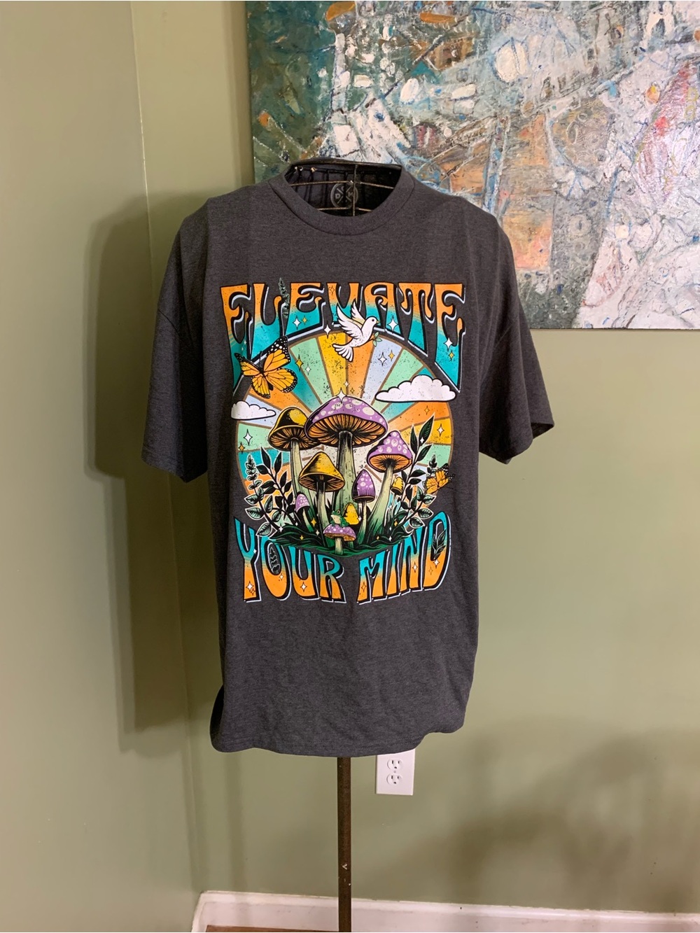 Mushroom themed T-shirt in size XL.